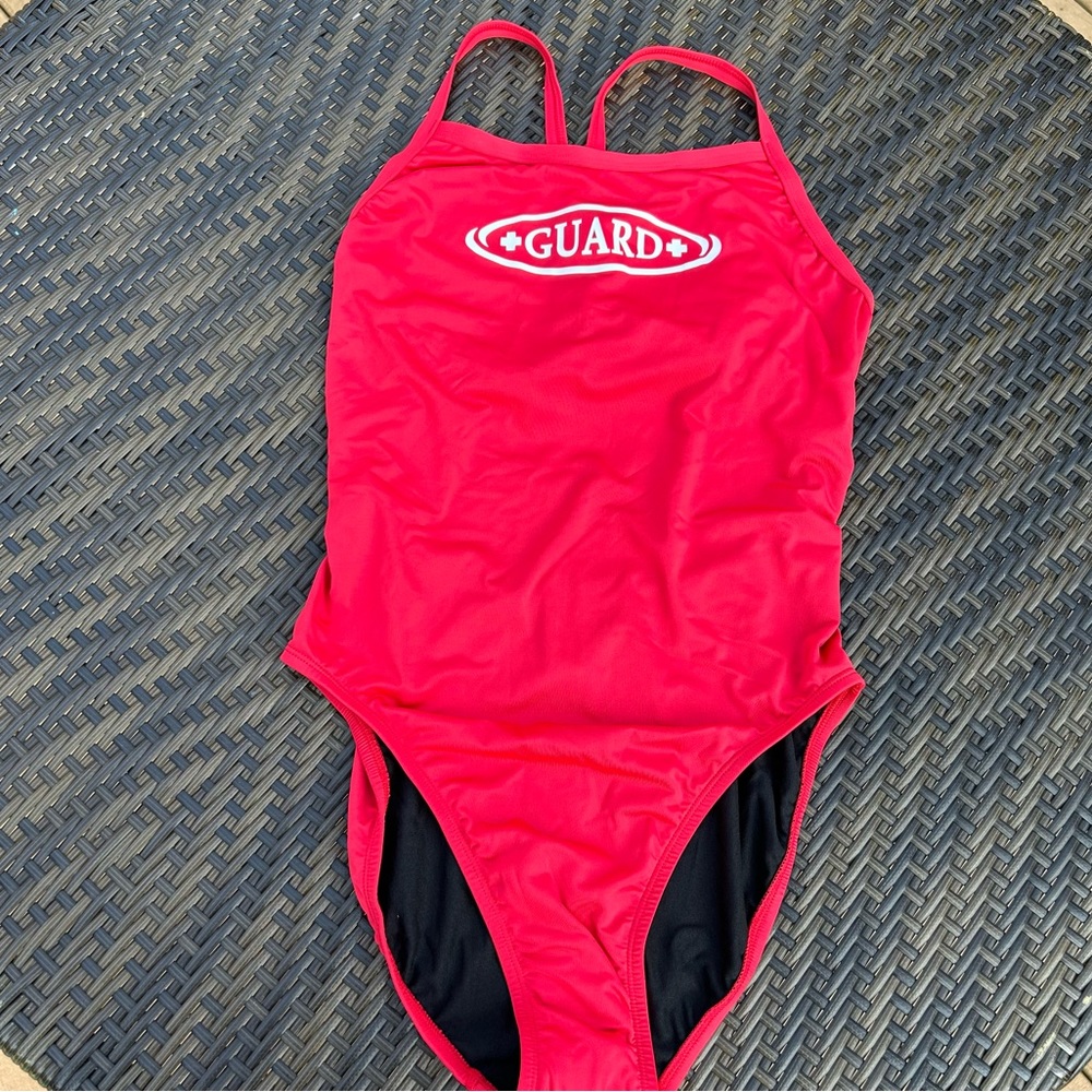 Guard one piece bathing suite with open back